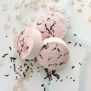 Goddess of Self-Love Bath Bombs handmade by Stresscase containing all natural cruelty-free ingredients.  Made in small batches and sprinkled lovingly with eco-friendly crystalline powder and Hibiscus flowers.